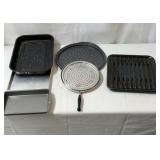 Assorted cookware. Ware steamer, baking pans and