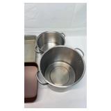 2 metal cooking and 2 cooking pots.