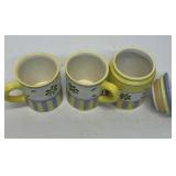 Empty candle jar and 2 porcelain drinking cups