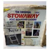 Stowaway brand boat boarding telescopic ladder.