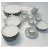 43 piece Noritake Elegance featuring a clean