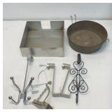 Assorted hangers and 2 metal pans.