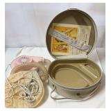 Vintage hair dryer with travel case.