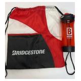 Bridgestone back pack bag and Biggby coffee mug.