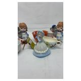 Porcelain set of 3 little girl statues and (2 are