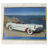 Framed antique car poster.