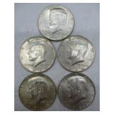 Five 1964 Kennedy Half Dollars