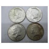 Four 1964 Kennedy Half Dollars