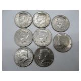Eight 1964 Kennedy Half Dollars