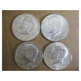 Four 1964 Kennedy Half Dollars