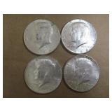 Four 1964 Kennedy Half Dollars