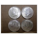 Four 1964 Kennedy Half Dollars