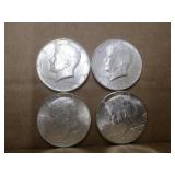 Four 1964 Kennedy Half Dollars