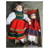 Two Collectible Dolls on Stands