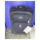 Travel Pro Suitcase w/Tags