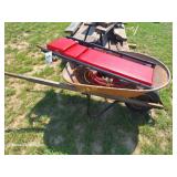 Creeper, 3/8' Air Hose, Elec. Cord. in Wheelbarrow