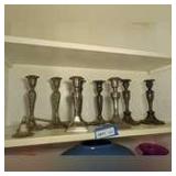 ALL FORMAL SILVER PLATE CANDLESTICKS ON SHELF MARKED 1071
