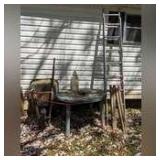 ALL ITEMS IN OUTSIDE SHOP 1 AREA MARKED OFF AS 1305 INCLUDING WHEELBARROW, OUTDOOR TABLE, LARGE METAL HOOK, HOME AND GARDEN SPRAYER, WOOD LEG SAWHORSES, AND ALL AMERICAN LADDER CO. 16 FT EXTENSION LAD