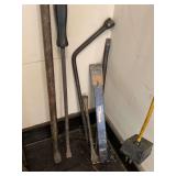 ASSORTMENT OF TIRE IRONS & CROW BARS - GARAGE CLOSET