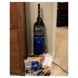 HOOVER WIND TUNNEL VACUUM WITH BASKET OF ACCESSORIES - UP BED 1