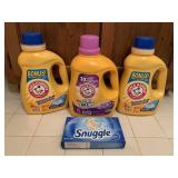 3 ARM & HAMMER LIQUID LAUNDRY DETERGENT & 1 BOX OF SNUGGLE DRYER SHEETS (MOST FULL)- UP MASTER BATH