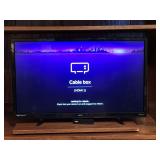 31" SANYO-ROKU FLAT SCREEN TV (NO REMOTE) WORKS - UP BED 1