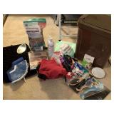 BROWN TRASH CAN/DOG FOOD CONTAINER FULL OF PET SUPPLIES TO INCLUDE NEW CRATE LINER, DR MARTIN DOG FOOD, DOG SWEATERS & MORE - UP MASTER CLOSET 1