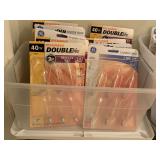 CRATE FULL OF 40 W SMALL BASE CHANDELIER BULBS (10 PACKAGES OF 6 - CRATE & LID INCLUDED - UP HALLWAY