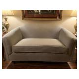 VINTAGE CAMEL BACK NEUTRAL UPHOLSTERED ONE CUSHION LOVESEAT (UPHOLSTERY DONE BY ROWLAND