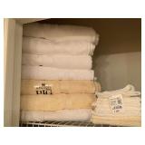 LOT OF ASSORTED NEW TOWELS - UP HALL BATH CLOSET