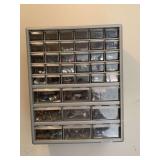 WALL STORAGE CONTAINER FULL OF MISC SCREWS, NUTS, BOLTS & MORE (BRING TOOLS TO TAKE OFF WALL) - GARAGE CLOSET