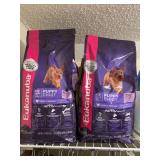 2 NEW BAGS OF EUKANUBA PUPPY FOOD 4.5 LBS EACH - UP MASTER CLOSET 2