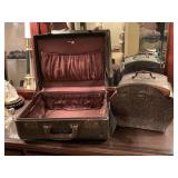 DECORATIVE WOODEN BOX COVERED IN METAL (HAS SEVERAL PLACES NEEDING TO BE GLUED) 11" WIDE X 9" TALL X 7" DEEP & VINTAGE LEATHER OVERNIGHT CASE (WON