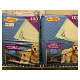 DOG TRAINING PADS (APPROX 200) - UP BED 1 CLOSET