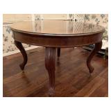 ANTIQUE HEAVY ROUND DINETTE TABLE WITH BUILT IN LEAF ON ROLLERS WITH GLASS TOP 48" ROUND X 30" TALL - DINETTE