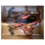 Assorted hand tools to include tin snips, chisel, finish hammer, and more. See pictures for details.