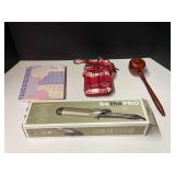 Assorted items to include a ladies clutch bag, journal, Conair Infiniti Pro curling iron, still new in the box, and teachers gavel, see pictures for details. ￼