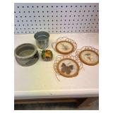 Assorted home decor to include artisan pottery, Looney Tunes ornament, vintage butterfly pressed bamboo coasters, outside edges are breaking off, and more. See pictures for details.