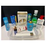 Assortment of toiletries to include shampoo, toothpaste, mouthwash, and more. Tub is not included, see pictures or details.