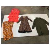 Assorted ladies clothing to include dresses, skirt, and sweater. Please inspect for size and fashion, see pictures for details.