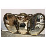 Ornate triple ring oval mirror, see pictures for details.