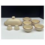 Stoneware to include salt and pepper shakers, portion bowls, and butter dish. Approximately nine pieces, see pictures for details.