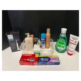Assorted toiletries to include toothpaste, mouthwash, body cream, lotion, sonicare 1100 toothbrush, and more. Tub is not included, see pictures for details.