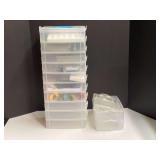 Stackable storage trays with some content, see pictures for details.
