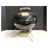 Small Weber tabletop grill, see pictures for details.