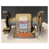 Craftsman bench grinder, 1/4 HP, powers up, see pictures for details.