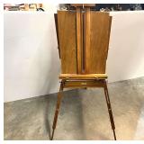 Portable art studio easel with art supplies, is missing a wing nut, see pictures or details.