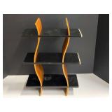 Small sound wave CD rack, see pictures for details.