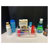 Assortment of toiletries to include shampoo, sunscreen, mouthwash, toothpaste, and more. Tub is not included, see pictures for details.