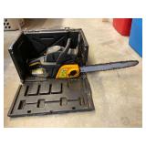 Chainsaw with carrying/storage case, believed to be a Poulan Pro, not locked up, see pictures for details.